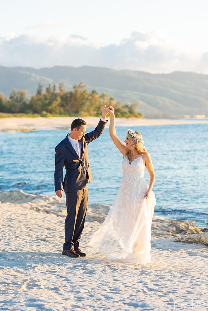 bride and groom on an Oahu beach