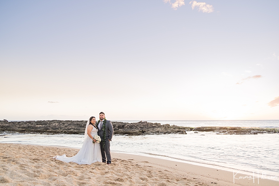 couple just married on hawaiian shore 