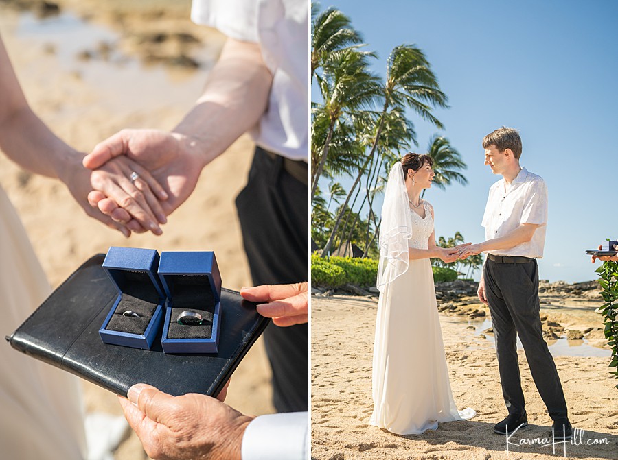 couple exchange rings on their wedding day in hawaii 
