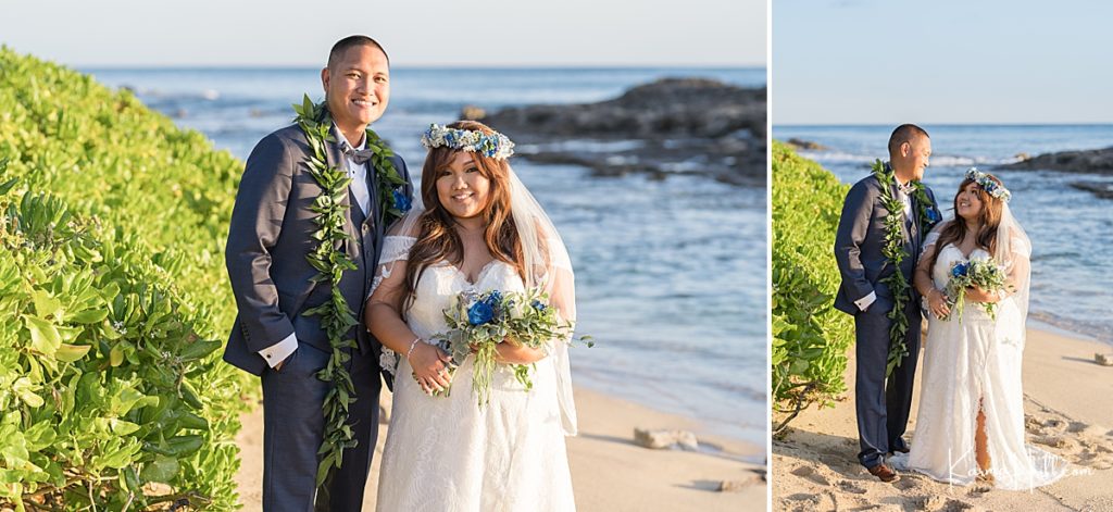 bride with blue bouquet stands with groom in tux on beach 