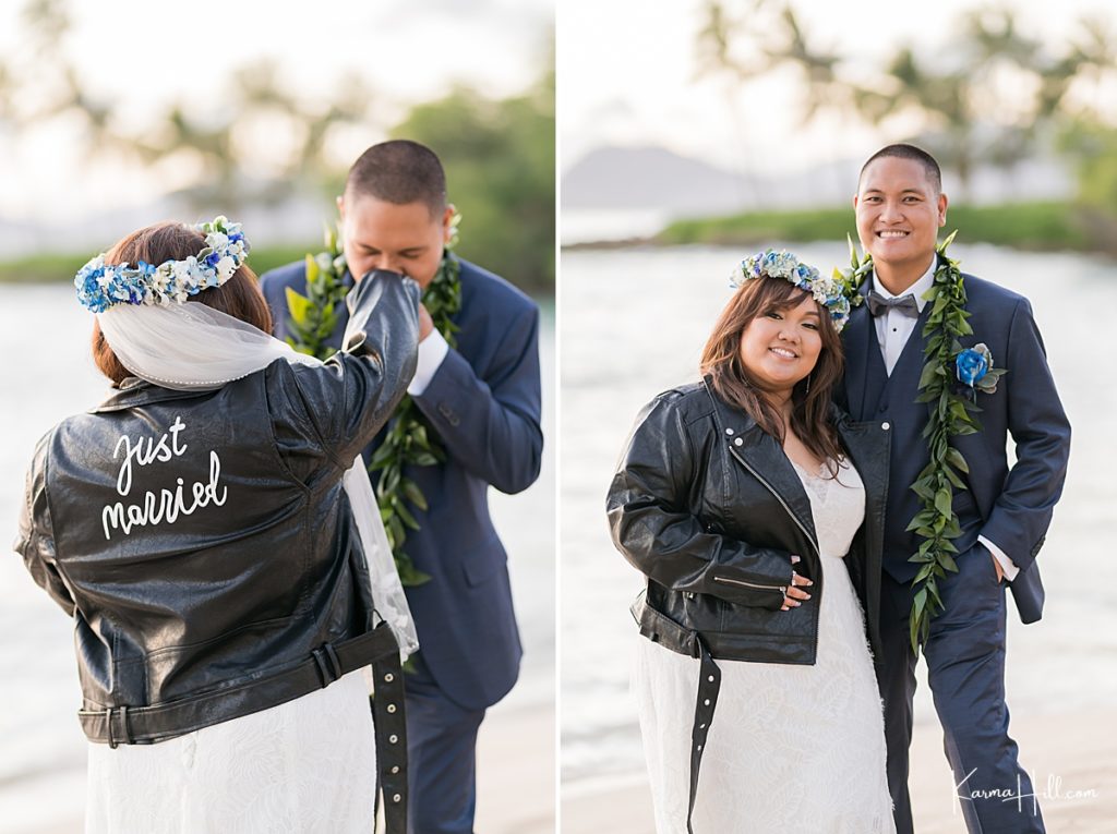 bride poses with leather just married jacket with groom 