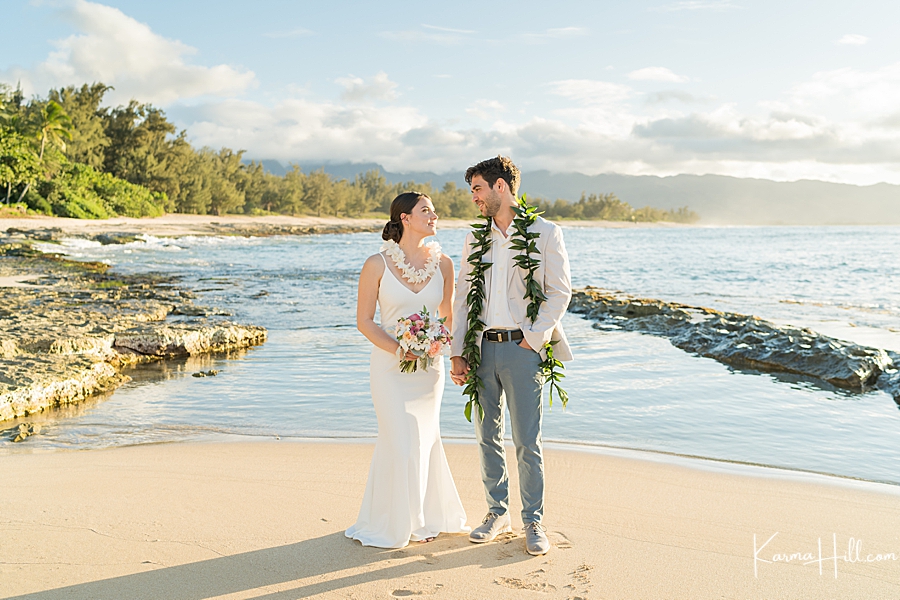 bride and groom at Oahu beach wedding