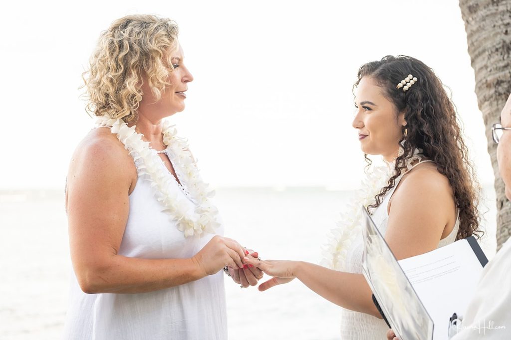 brides exchanging ring at hawaii wedding