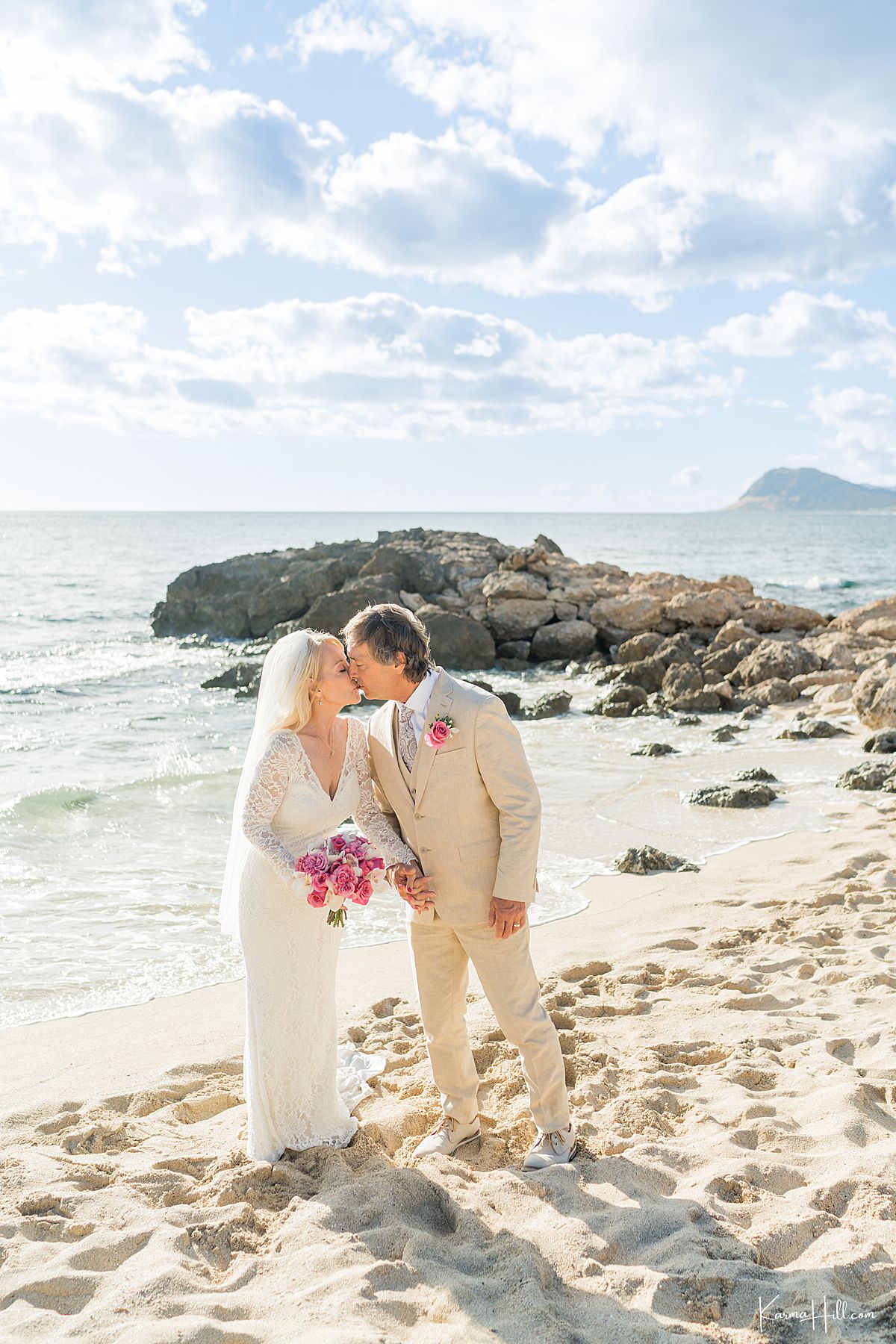 newlyweds on beach 